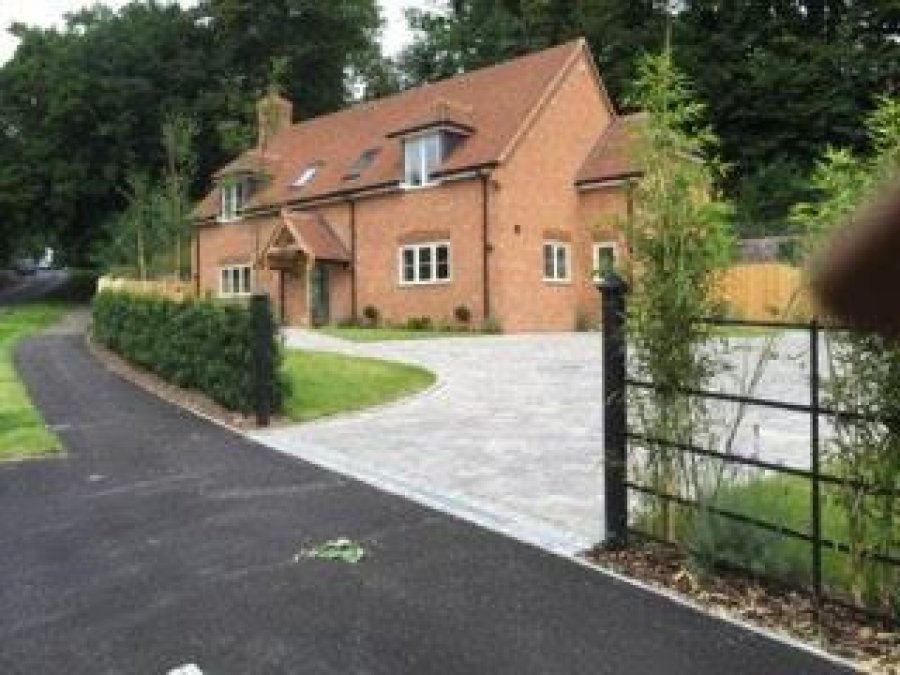 Metal fencing used in a modern, traditionally styled property to give an authentic look