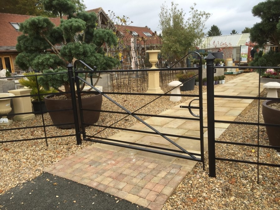Metal fencing and gate in use at a garden centre