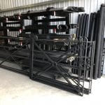 Various gates, posts and edging strips made by The Traditional Company, as stored within the workshop